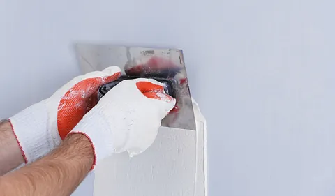 plastering wall